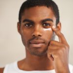 A young man applying face creamhttp://195.154.178.81/DATA/i_collage/pi/shoots/783406.jpg